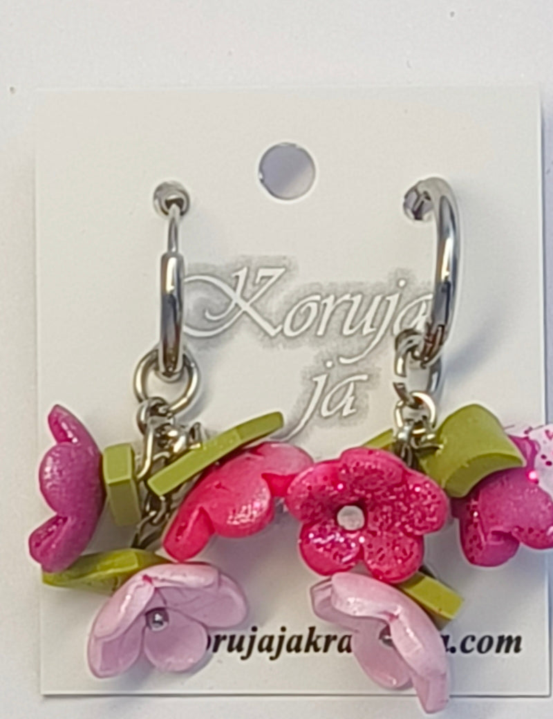 Kolme Kukkaa Korvakorut, Huggie-rengas